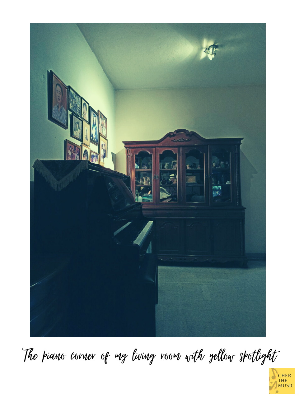 The piano corner of my living room with yellow spotlight